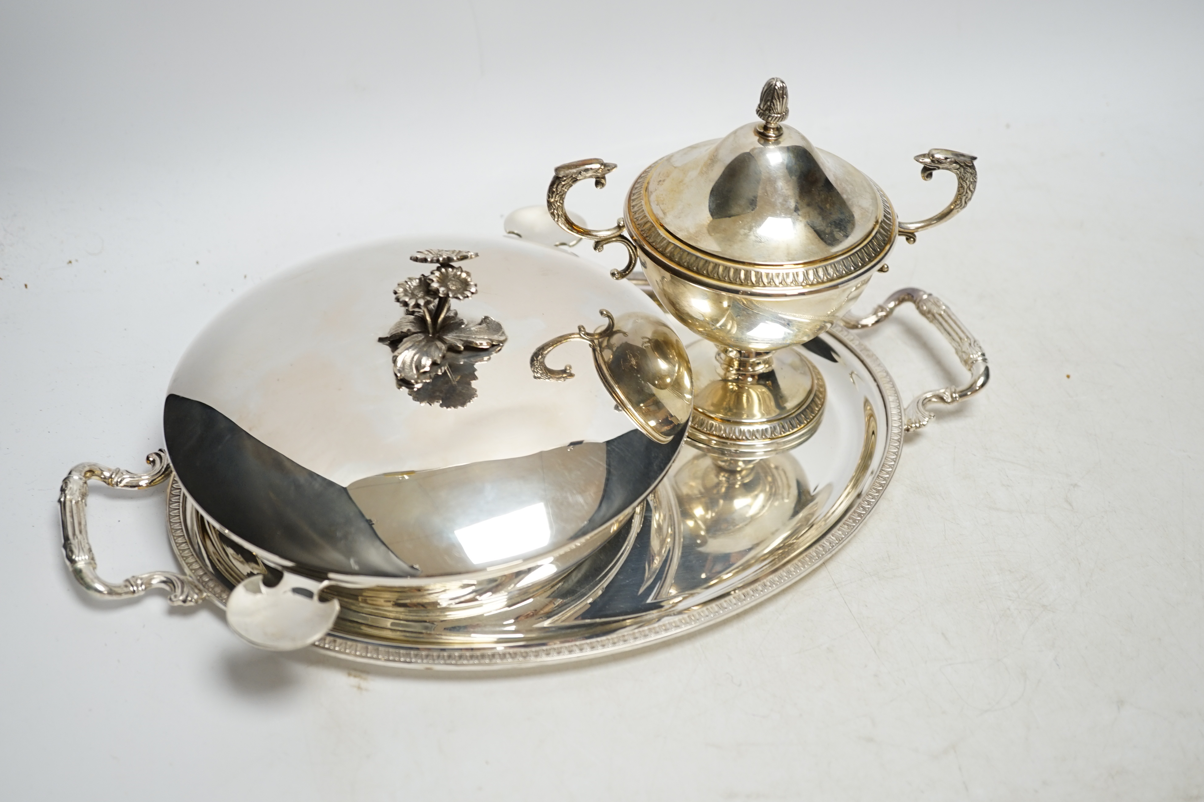 A modern Italian 800 standard two handled small oval tray, 33.6cm, a similar two handled cup and cover and a 925 shallow dish with matched 800 white metal cover, 33.7oz. Condition - fair to good